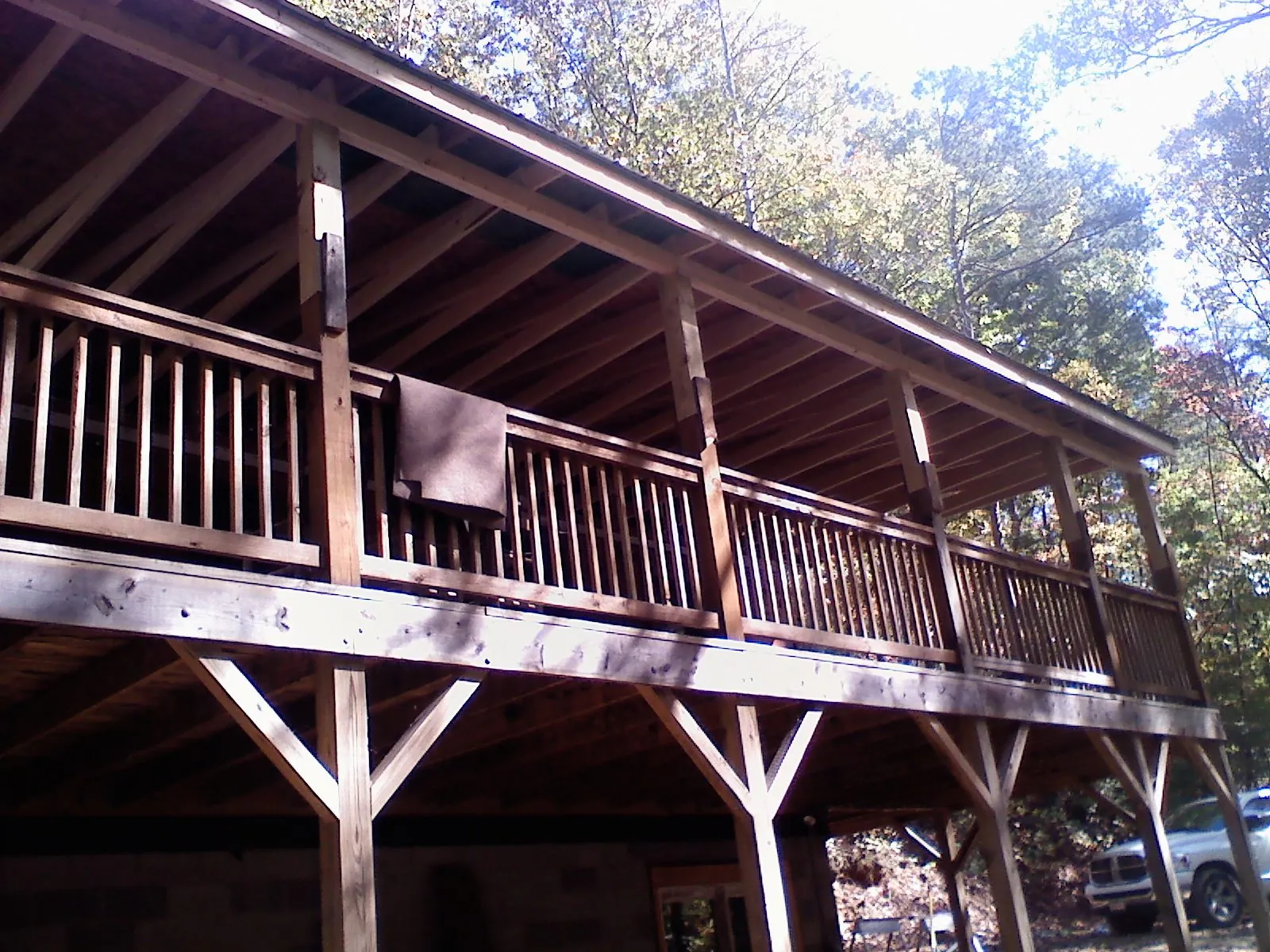 Timber framing under a new elevated porch and deck — Roof Leak Repair in Dowling by Roofing Brothers